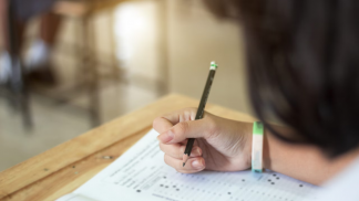 students-uniform-are-doing-test-classroom-scaled